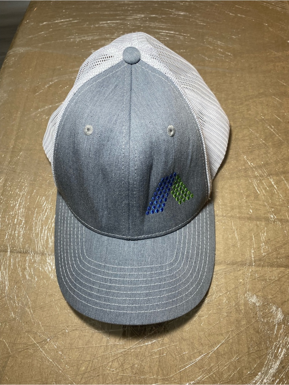 Men's Gray Mesh Back Trucker Hat with Blue & Green Accent